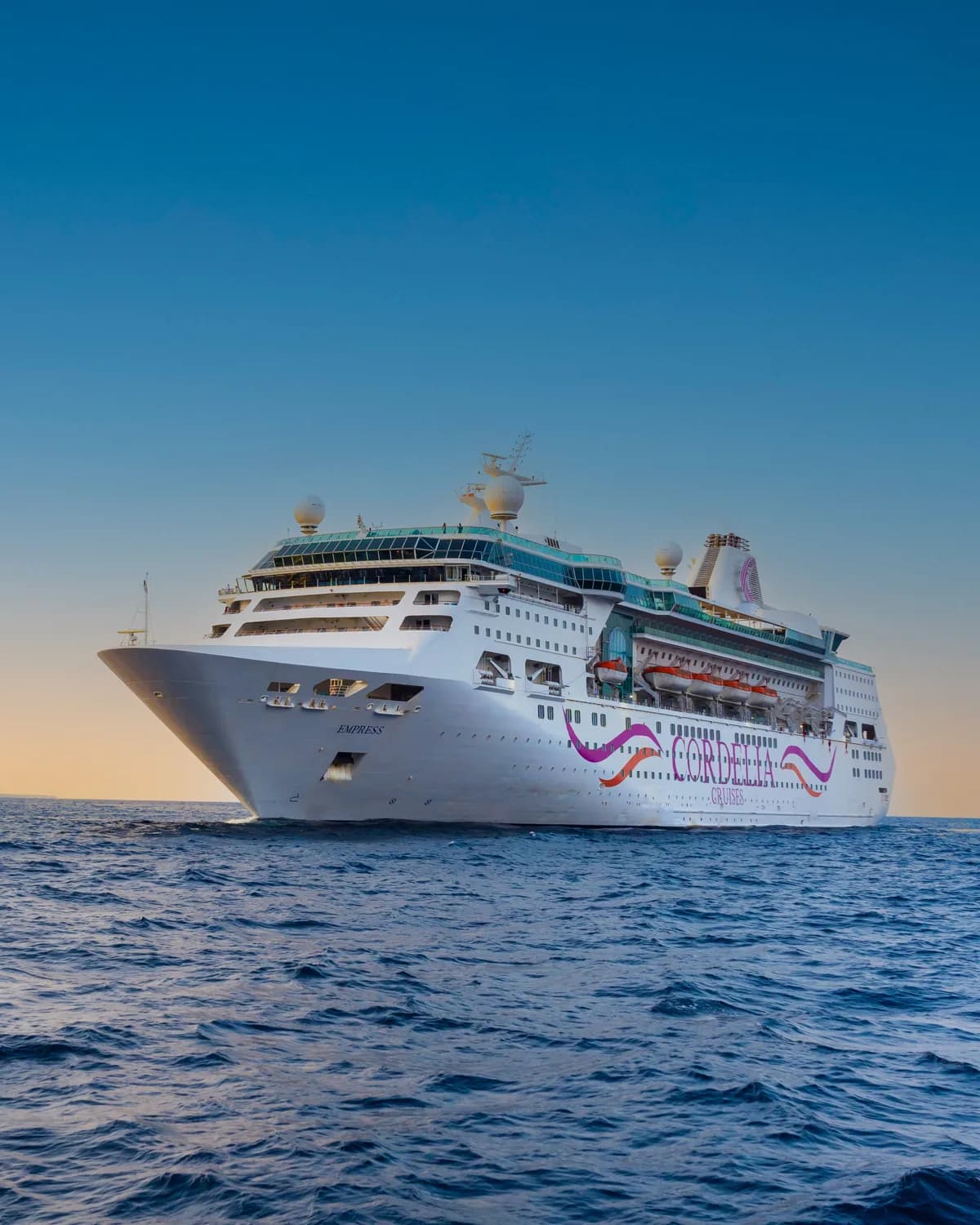 The Cordelia Empress cruise ship at sea at dusk