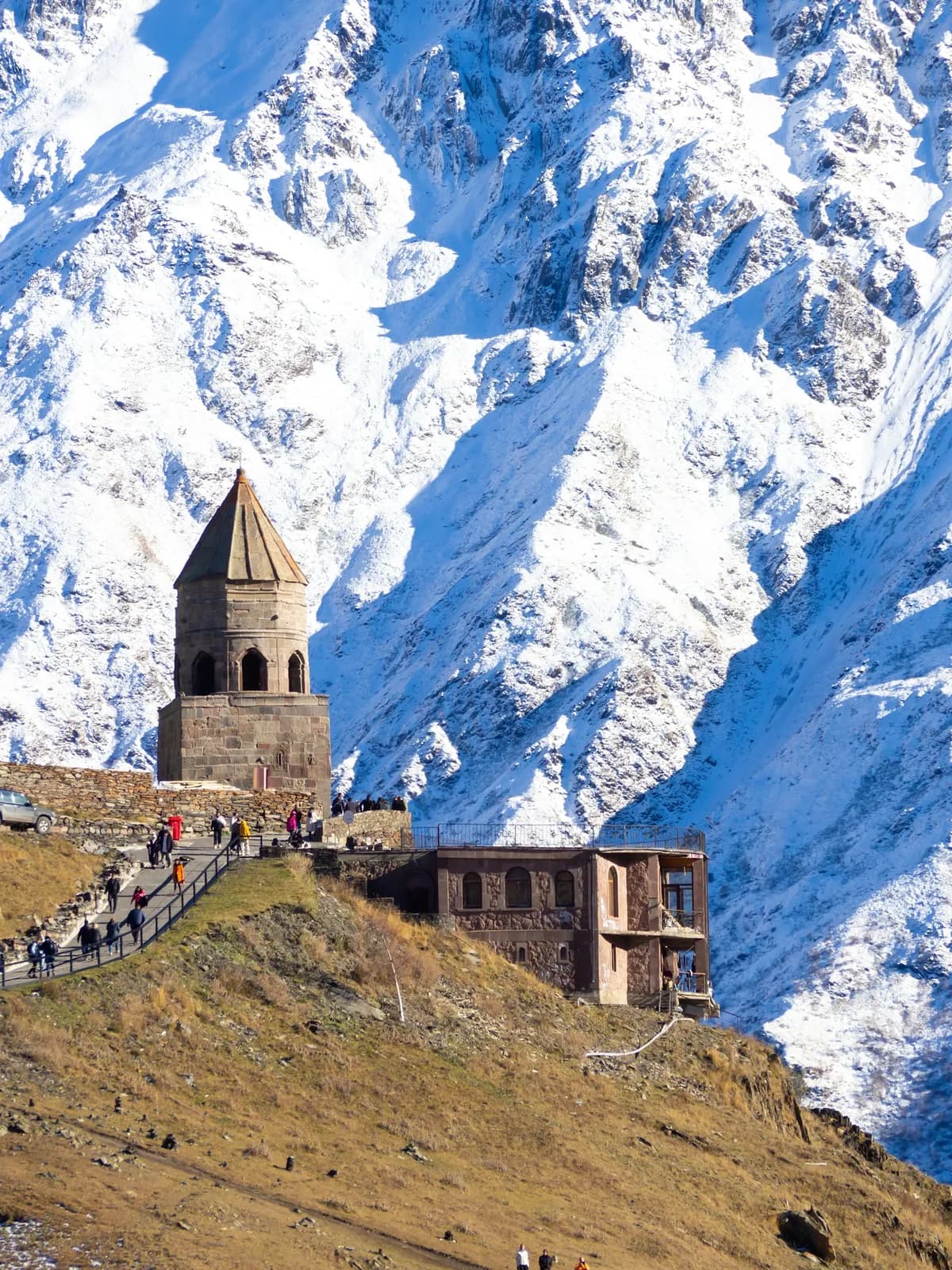 Gergeti Trinity Church below snowy peaks, Kazbegi