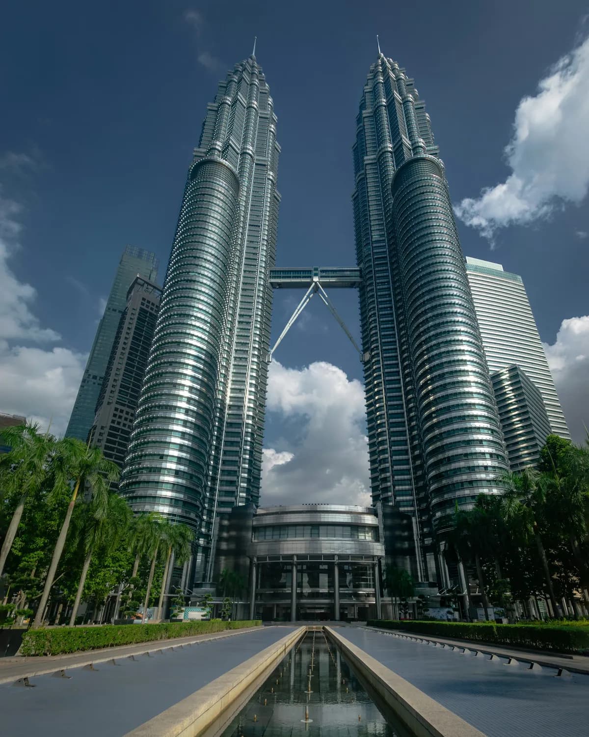 The Petronas Twin Towers above KLCC Park on a clear day, Kuala Lumpur
