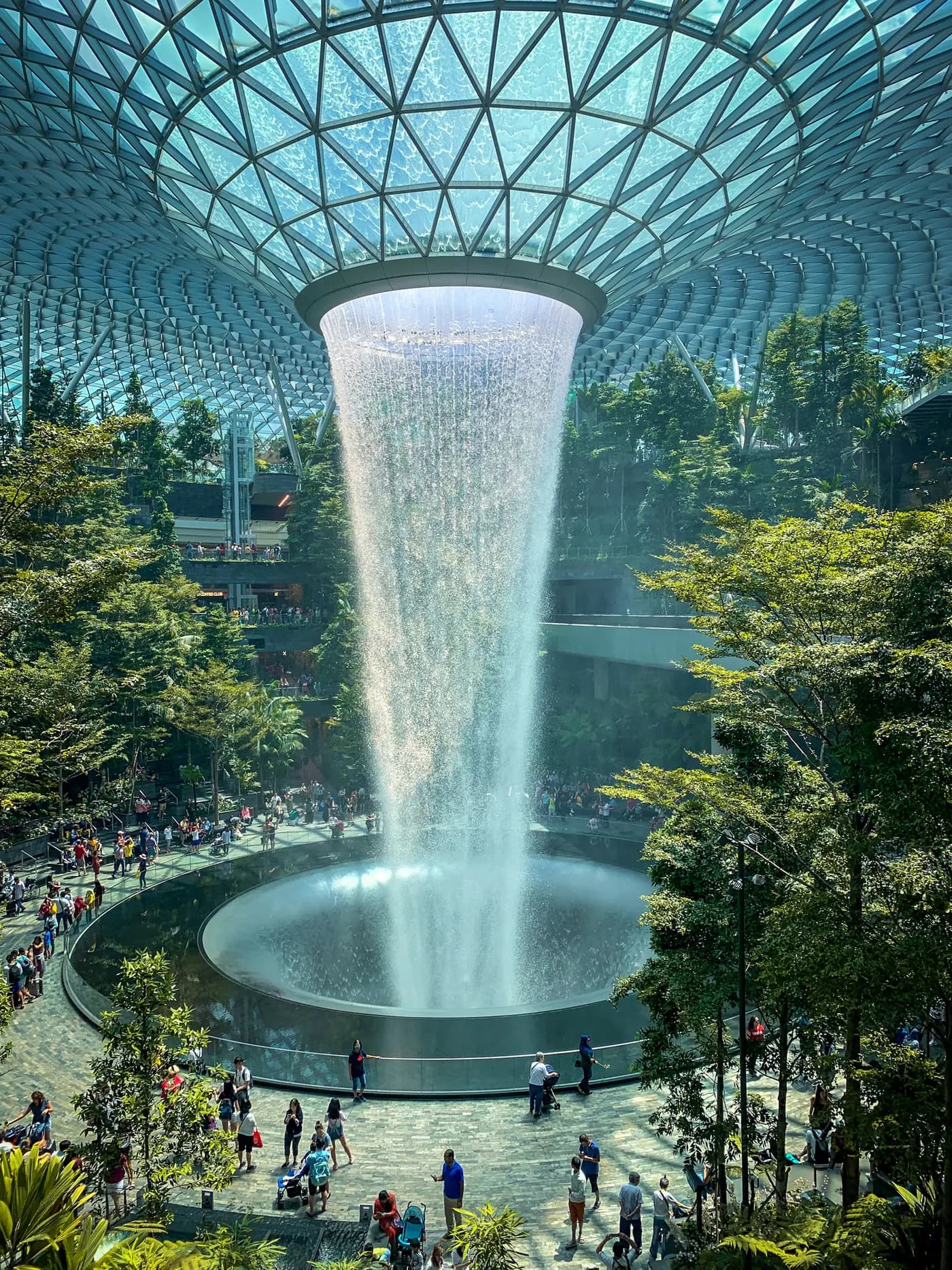 Visitors around the indoor waterfall at Jewel, Changi Airport