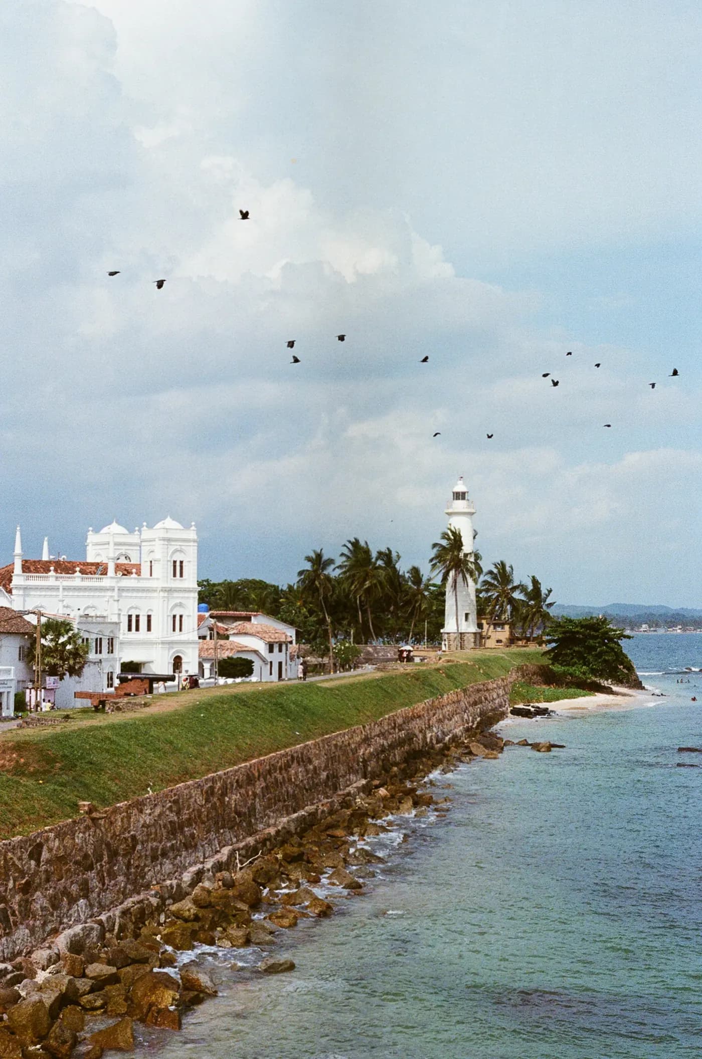 The ramparts and lighthouse of Galle Fort by the sea