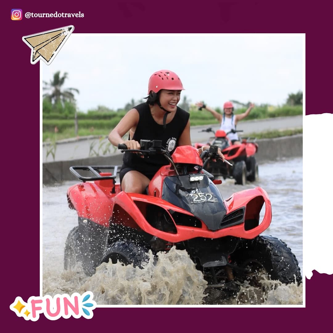 Splashing through water on a quad bike, Bali