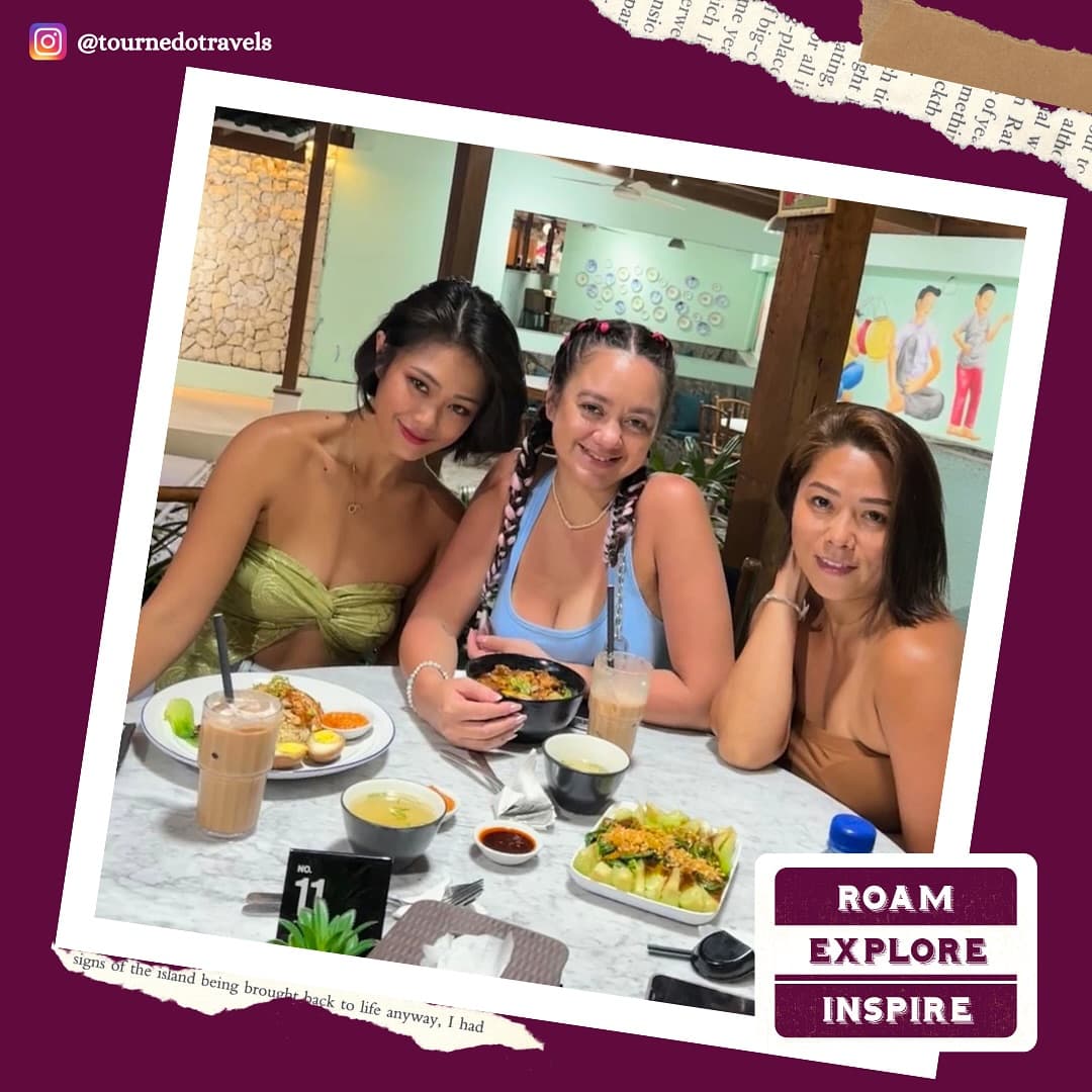 Three friends at lunch in a café, Bali