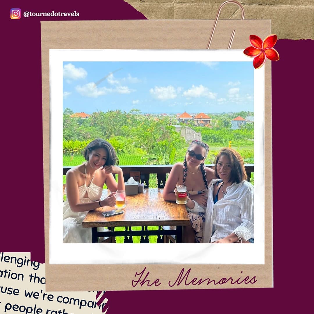 Three friends at lunch overlooking the rice fields, Bali