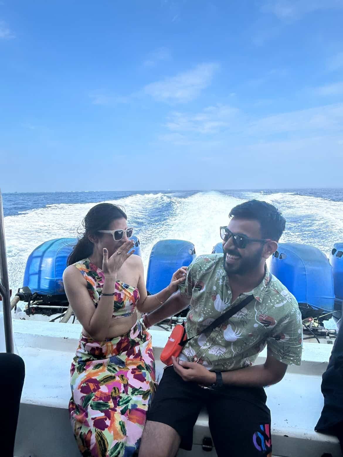 A couple on a speedboat off Bali