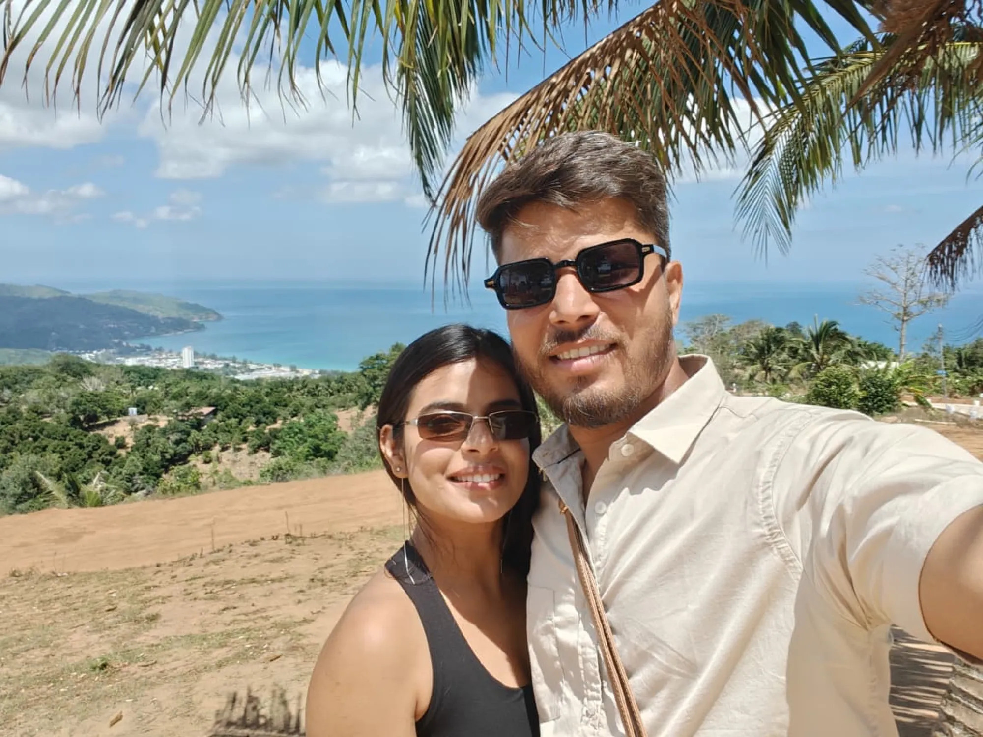 A couple's selfie on a hilltop above the sea, Phuket