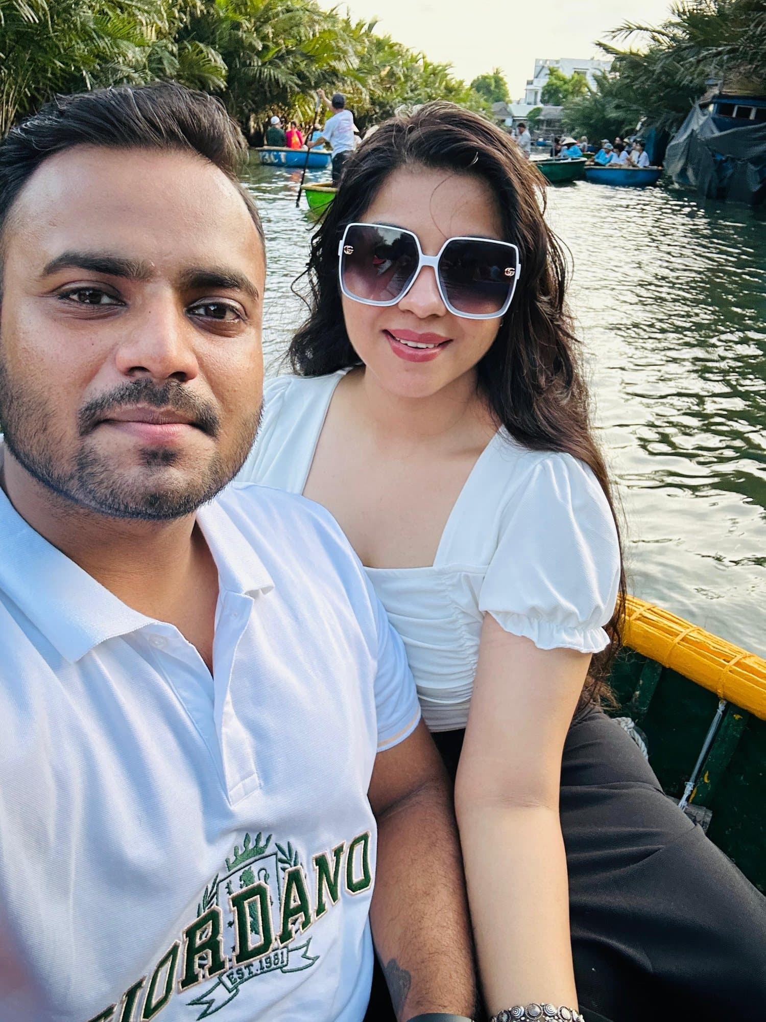 A couple's selfie on a basket boat ride, Hoi An
