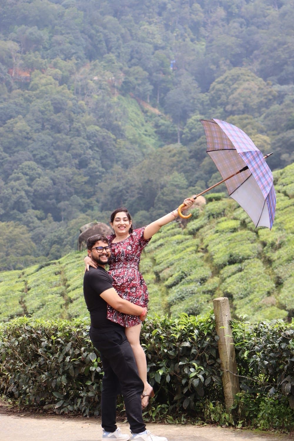 A couple in the tea estates of Munnar, Kerala