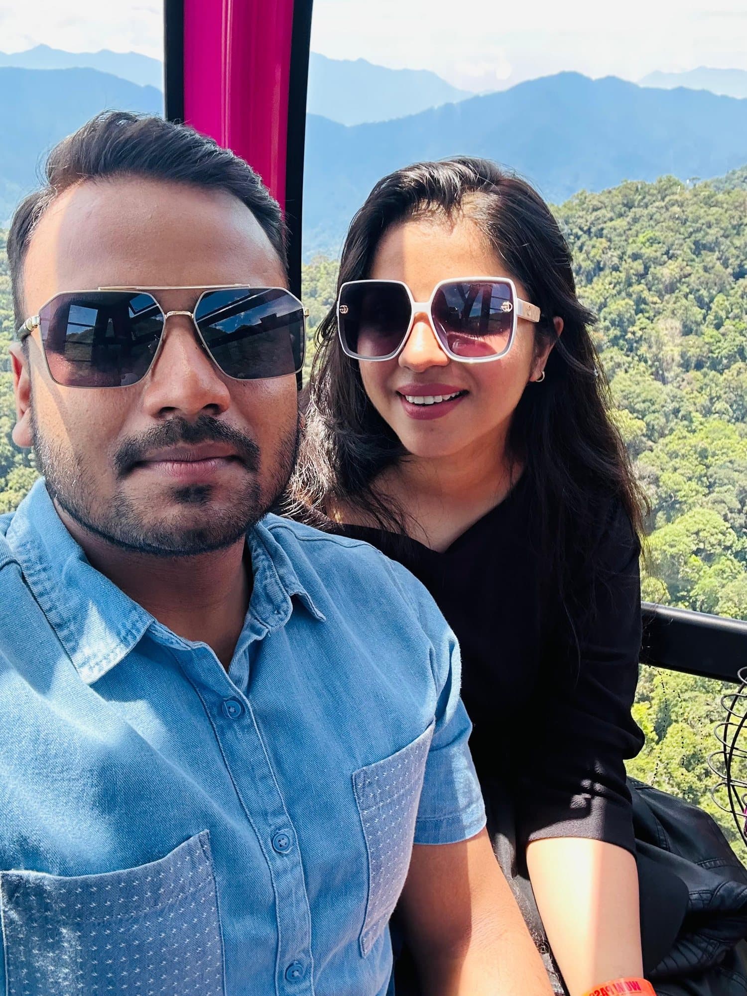 A couple's selfie in a cable car above the hills, Vietnam