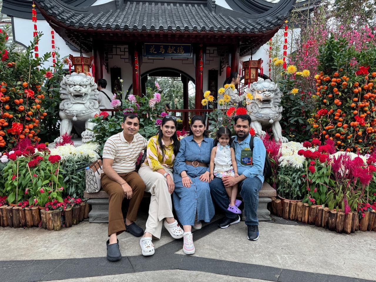 A family with a young child at a Chinese garden, Singapore