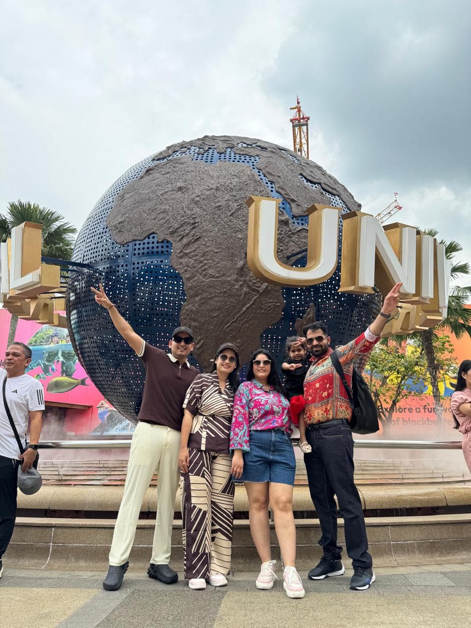 A family at the Universal Studios globe, Sentosa