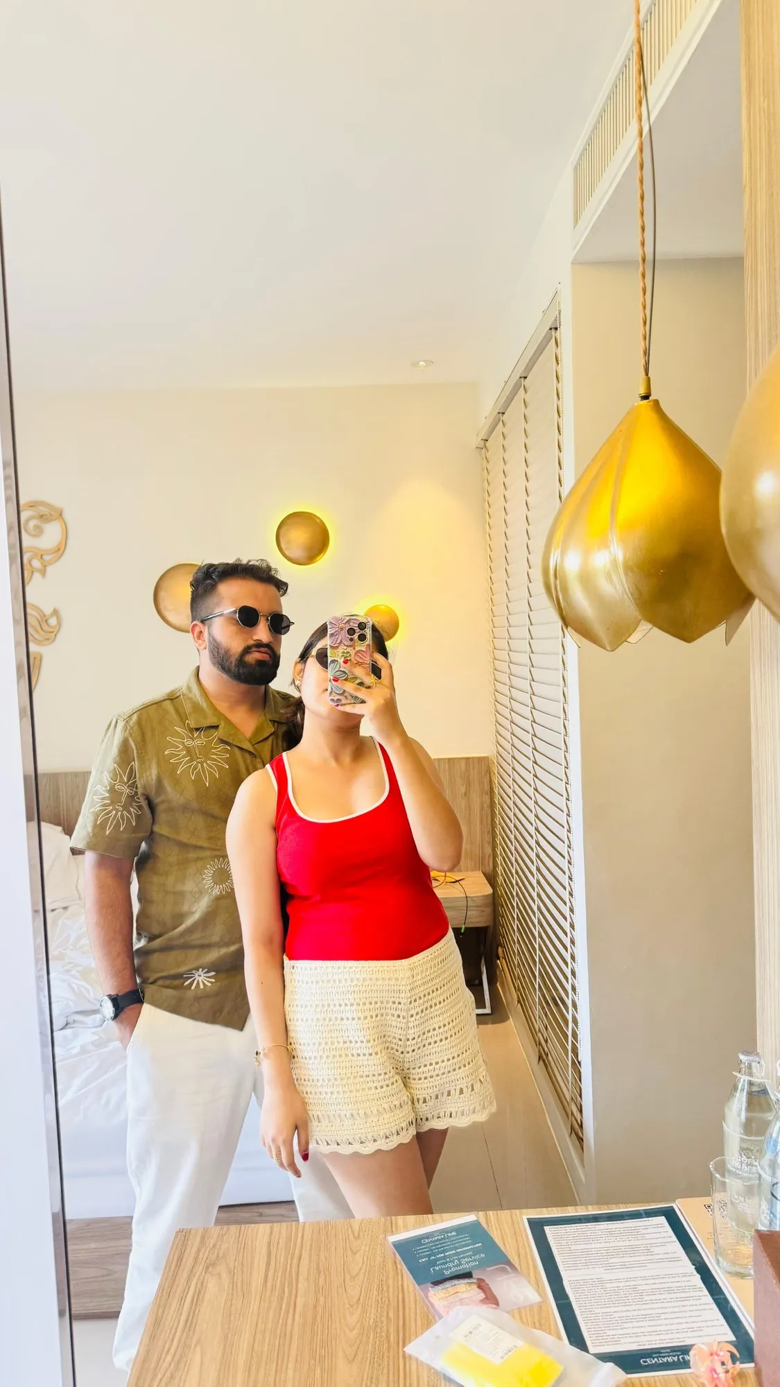 Couple at their hotel room mirror on check-in day